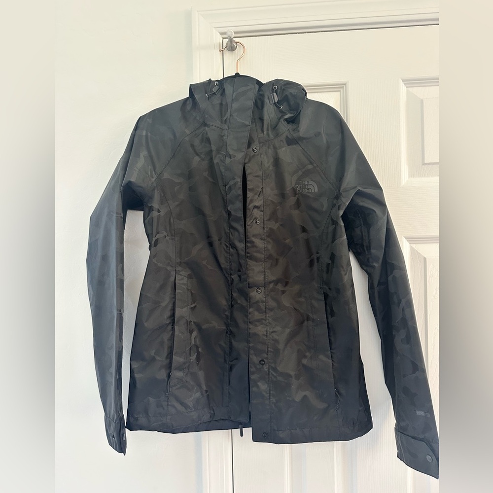 The North Face black camo rain jacket